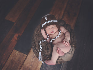 Brown & white football earflap hat by Two Seaside Babes