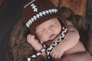 Brown & white football earflap hat by Two Seaside Babes