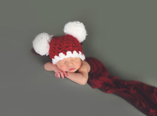 Red & white giant pom pom Christmas Santa hat, newborn size, designed and crocheted by Two Seaside Babes