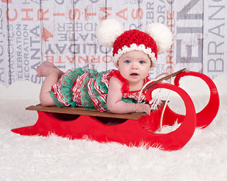 Red & white giant pom pom Christmas Santa hat, 3 - 6 month size, designed and crocheted by Two Seaside Babes