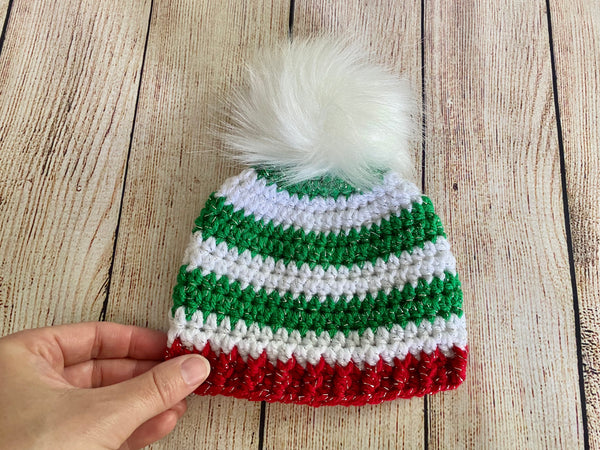 Green, white, and red sparkle faux fur pom pom striped Christmas hat
