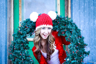 Red & white giant pom pom Christmas Santa hat, adult size, designed and crocheted by Two Seaside Babes