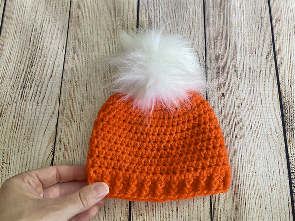 Pumpkin faux fur pom pom hat by Two Seaside Babes