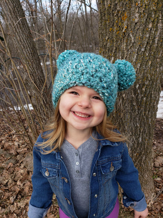 Teal giant pom pom winter hat