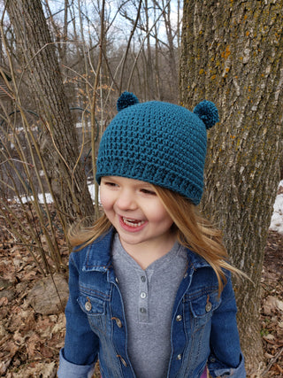 Teal mini pom pom hat