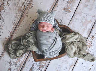 Pale gray mini pom pom hat