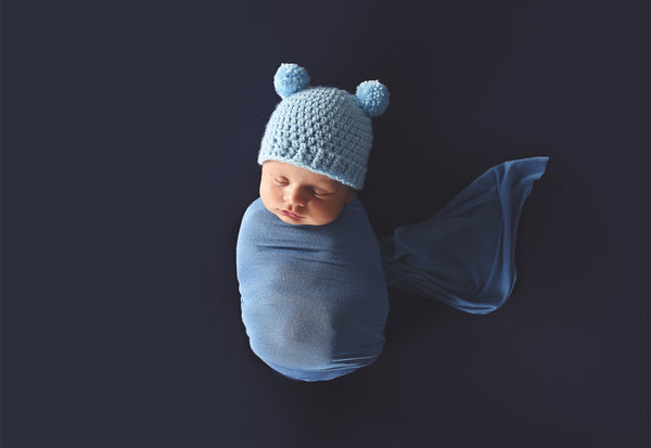 Baby blue mini pom pom hat