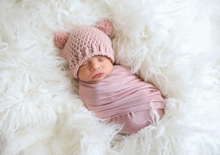 Rose pink mini pom pom hat