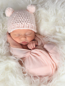 Pale pink mini pom pom hat by Two Seaside Babes