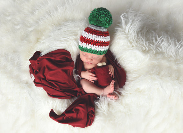 Red & white striped Christmas hat with giant green pom pom