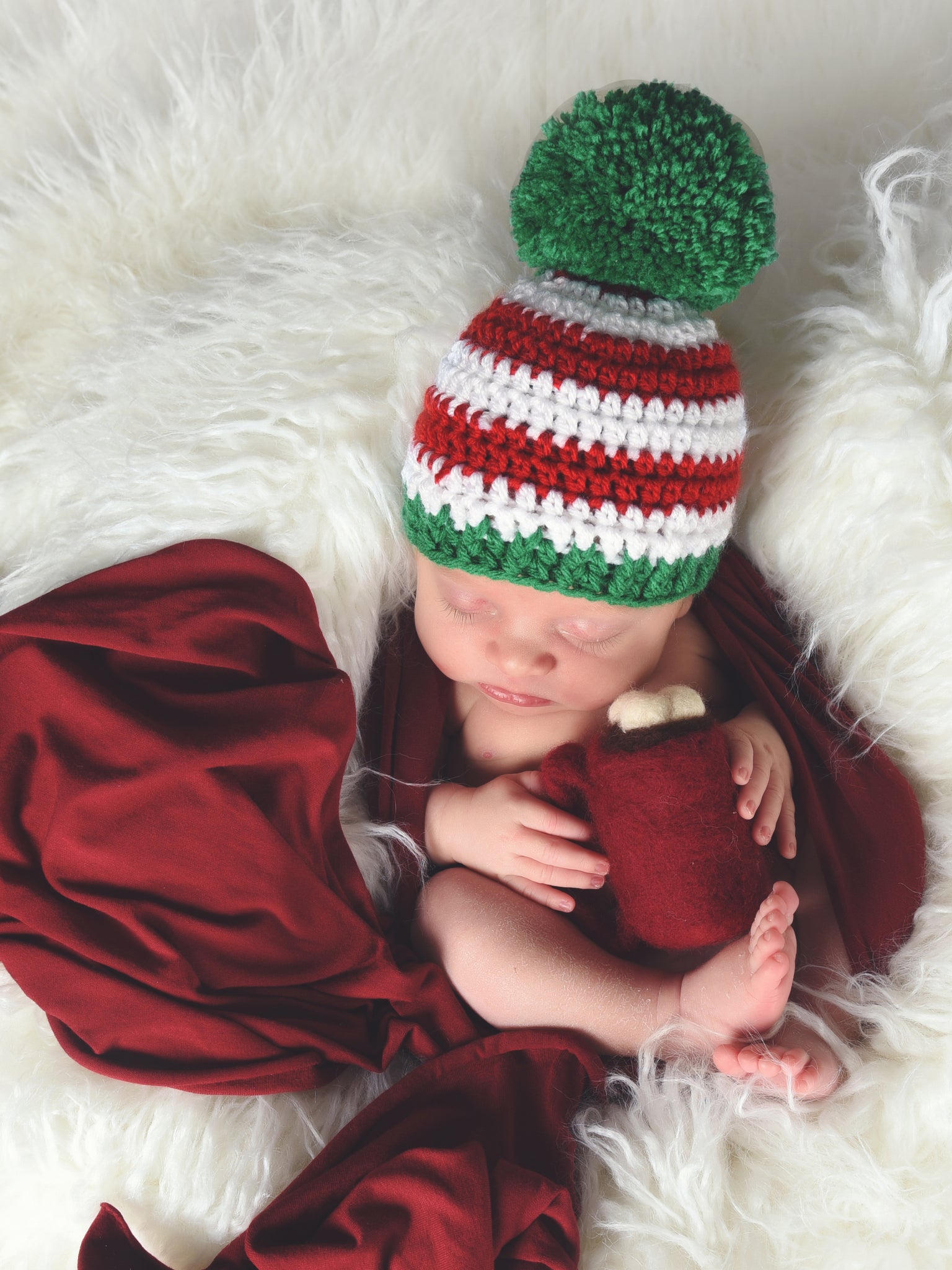 Red & white striped Christmas hat with giant green pom pom by Two Seaside Babes