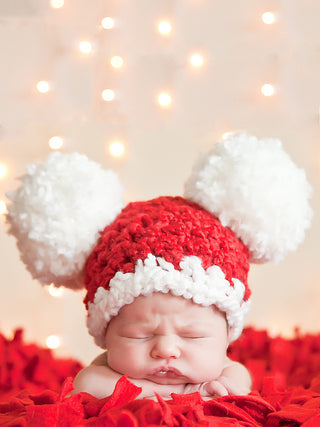 Red & white giant pom pom Christmas Santa hat, newborn size, designed and crocheted by Two Seaside Babes