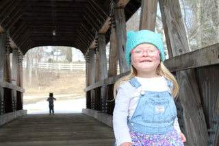 Aqua blue mini pom pom hat