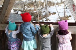 Red, aqua blue, olive green, and orchid mini pom pom hats