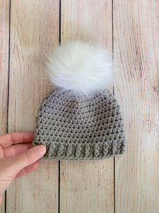Gray faux fur pom pom hat by Two Seaside Babes