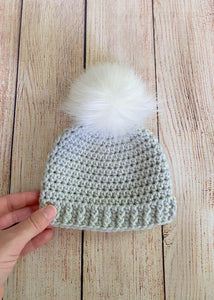 Pale gray faux fur pom pom hat by Two Seaside Babes