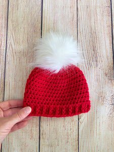 Red faux fur pom pom hat by Two Seaside Babes
