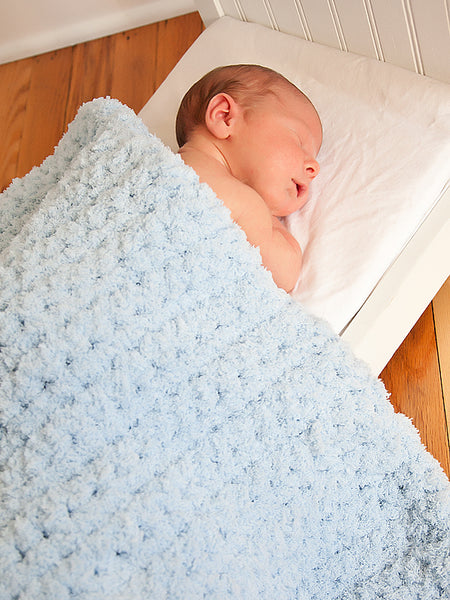 Blue soft and fluffy crochet baby blanket by Two Seaside Babes