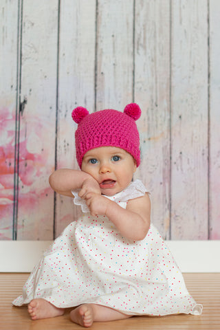 Hot pink mini pom pom hat