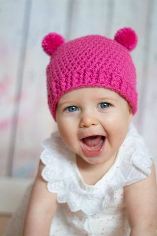 Dark pink mini pom pom hat