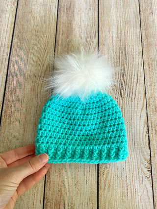 Aqua blue faux fur pom pom hat by Two Seaside Babes