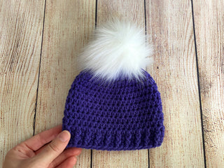 Purple faux fur pom pom hat