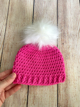 Dark pink faux fur pom pom hat by Two Seaside Babes