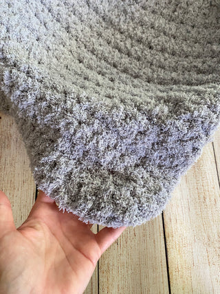 Light gray soft and fluffy crochet baby blanket