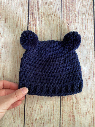 Navy blue mini pom pom hat by Two Seaside Babes