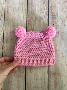 Pink mini pom pom hat by Two Seaside Babes