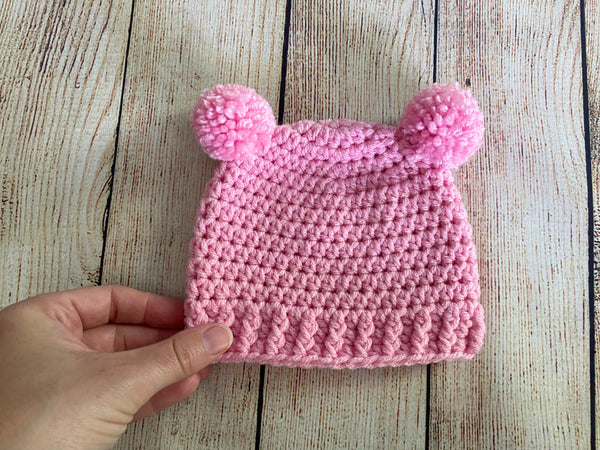 Pink mini pom pom hat