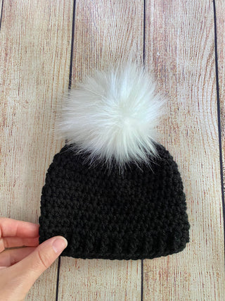 Black faux fur pom pom hat by Two Seaside Babes