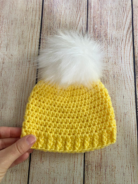 Yellow faux fur pom pom hat by Two Seaside Babes