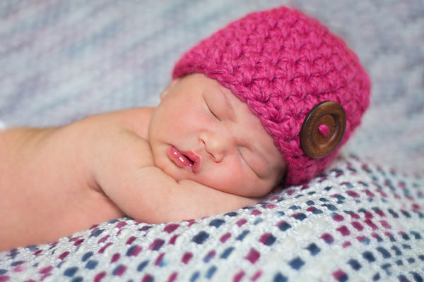 Raspberry pink button beanie baby hat
