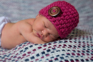 Raspberry pink button beanie baby hat